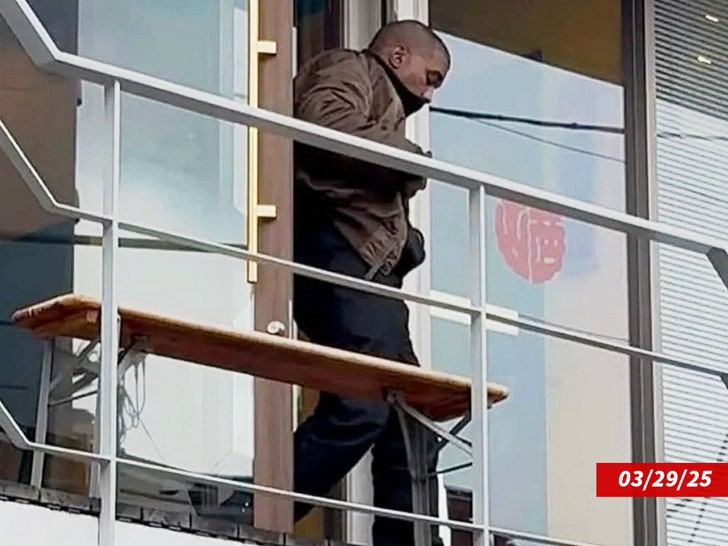 Kanye West is seen leaving a store in Tokyo backgrid