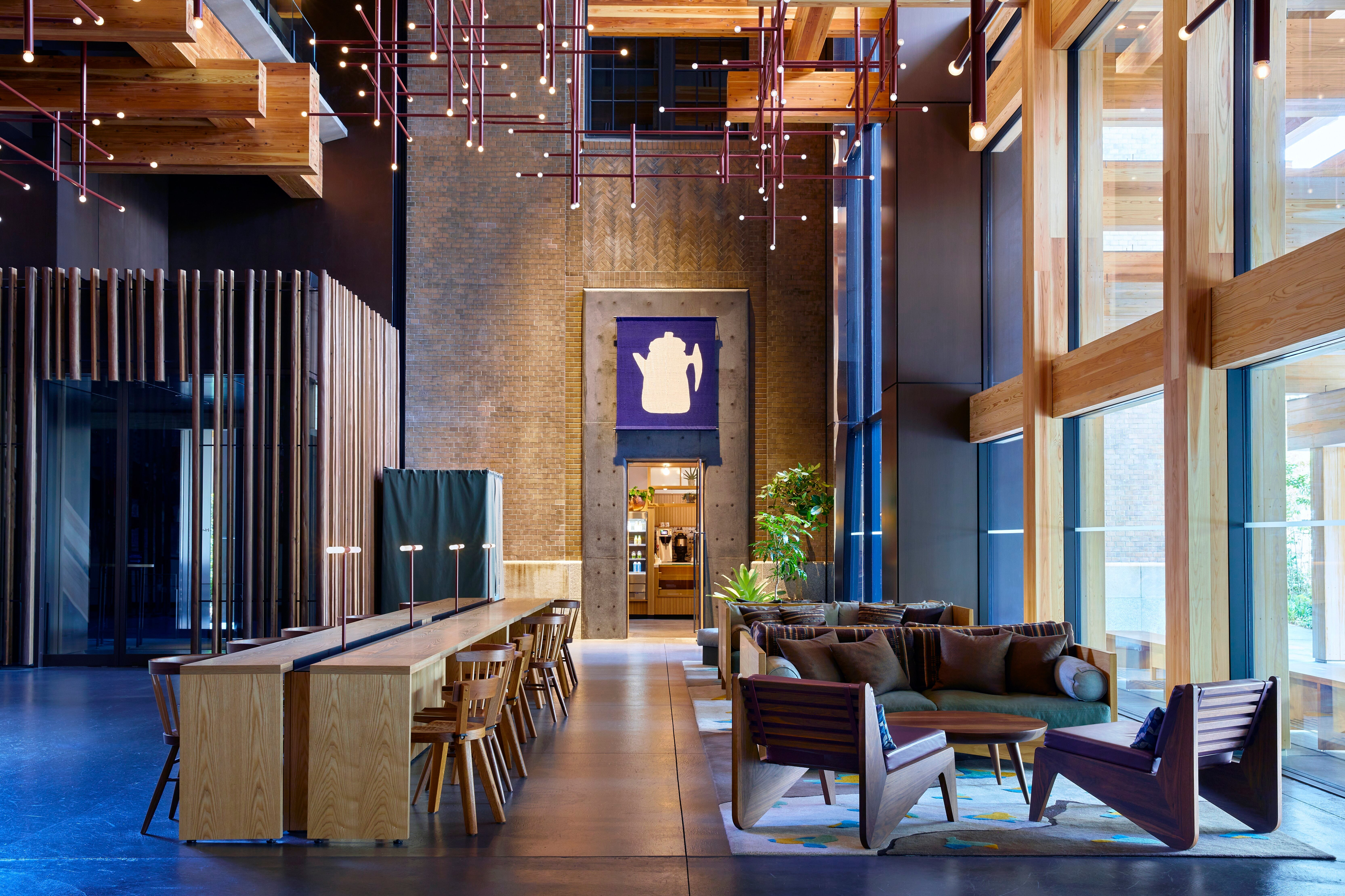 The reception and lobby area at the front of Ace Hotel Kyoto