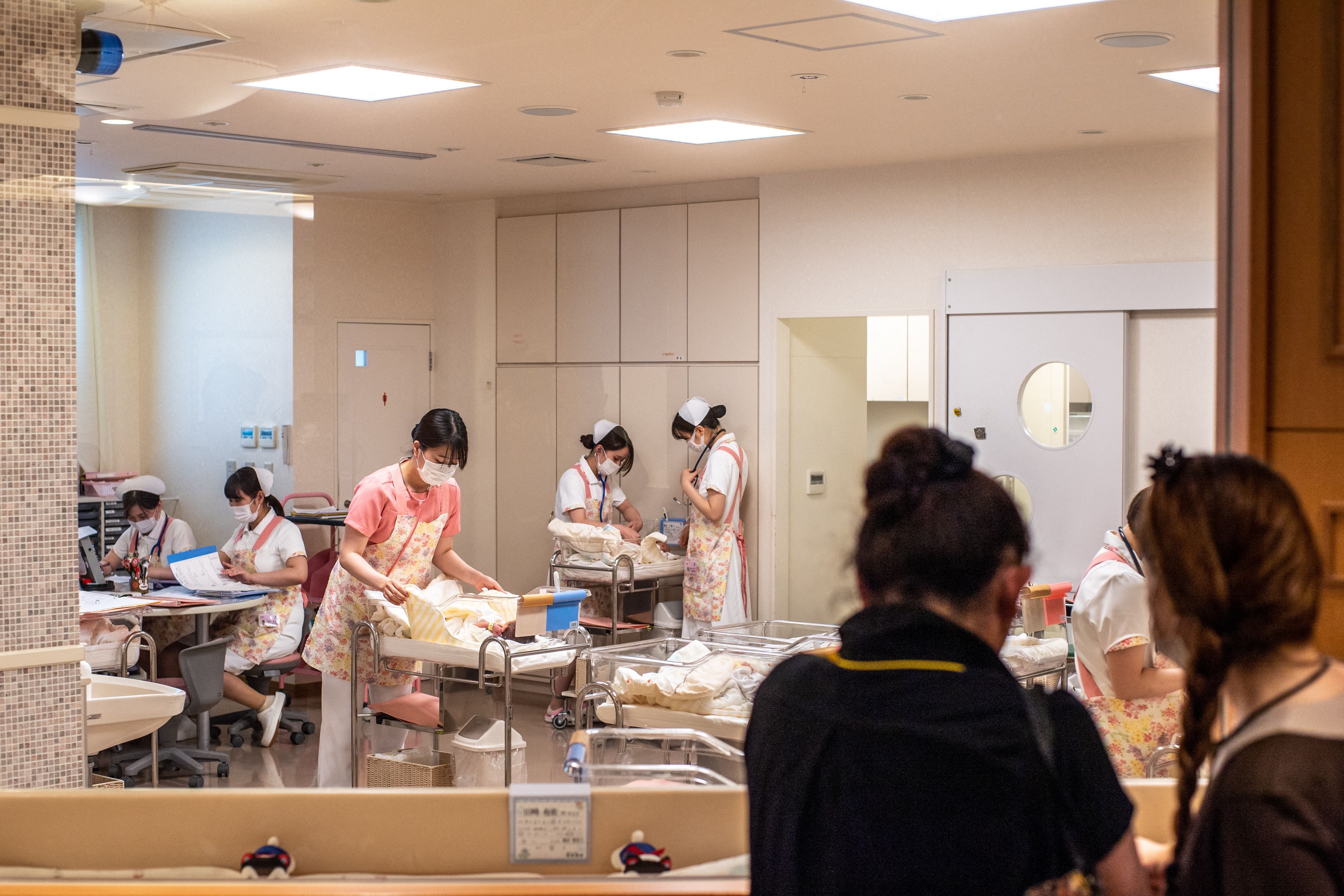 Staff working in a nursery room at Jikei hospital in Kumamoto