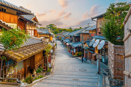 A sunset view of a steep street in Kyoto, Japan