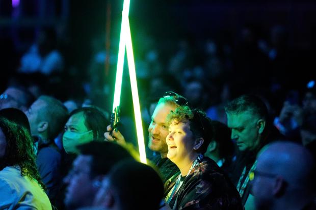 Fans watch the opening act during the Star Wars Celebration...
