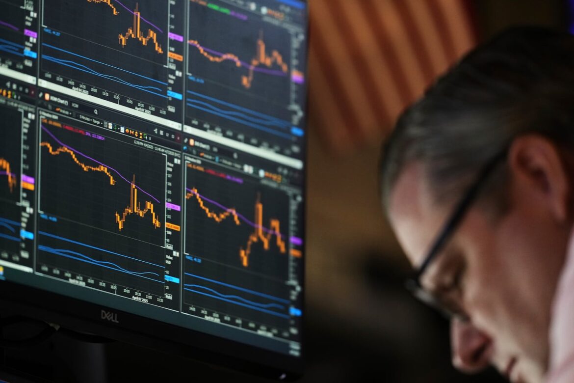 An electronic display shows financial information on the floor at the New York Stock Exchange in New York on April 7.