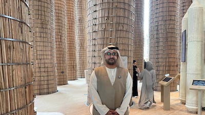 Ahmed Al Darei, an Emirati youth ambassador at the UAE pavilion in Osaka, Japan, is acting as a guide for visitors and says the date palm is the 'hero' of the pavilion. Ramola Talwar Badam / The National