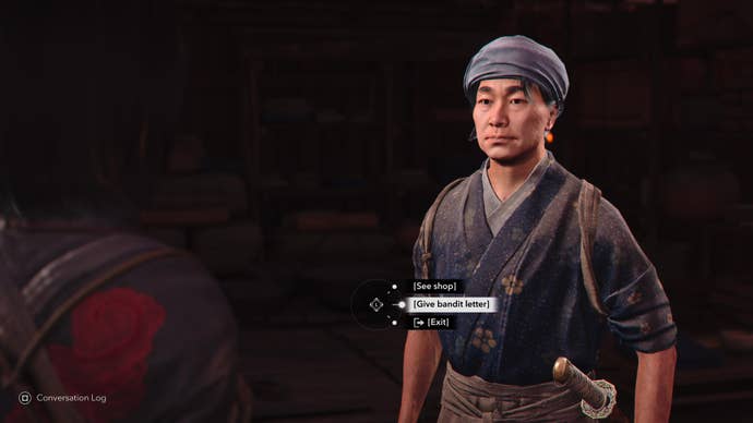 Naoe speaking to the Iron Hand Guild merchant, Kin-no-suke, in Assassin's Creed Shadows.