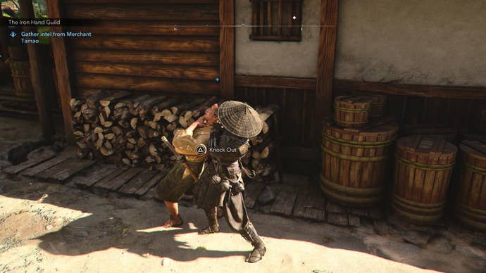 Naoe knocking out the merchant Tamao from the Iron Hand Guild in Assassin's Creed Shadows.