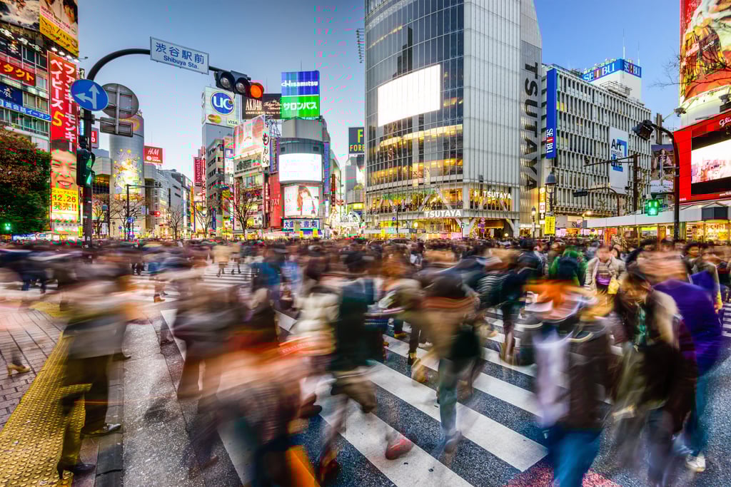 Pedestrians walk at Shibuya Crossing. The scramble pedestrian crossing is one of the largest in the world. Photo: Shutterstock