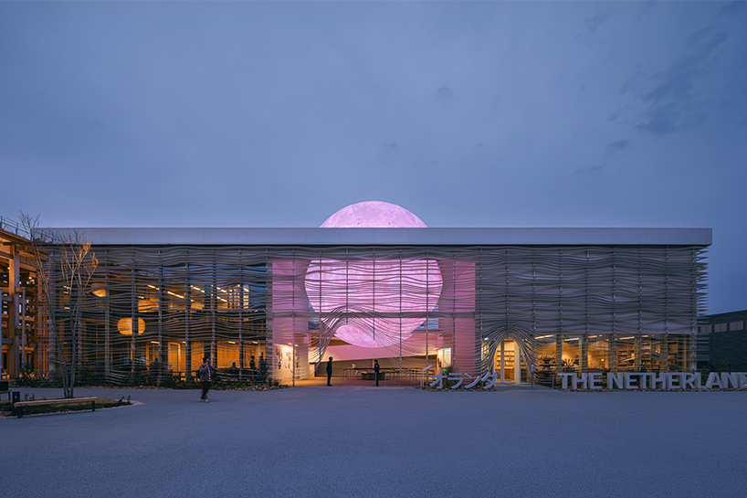 giant luminous sphere emerges from white layered netherlands pavilion at expo 2025 osaka