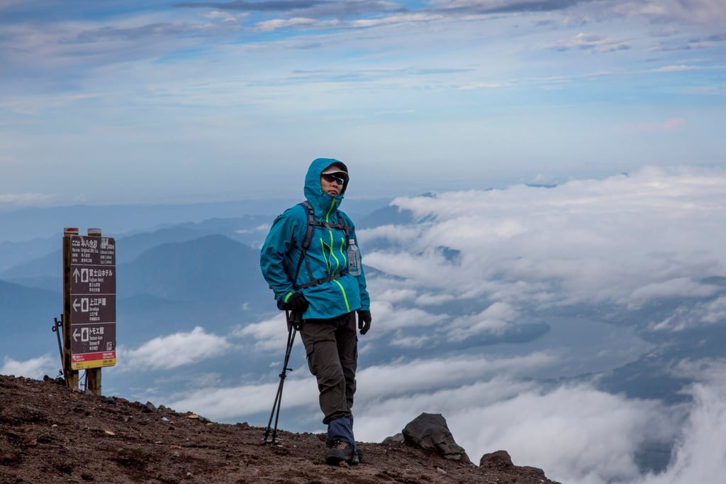A hiker stands on Mount Fuji. Photo: Getty Images