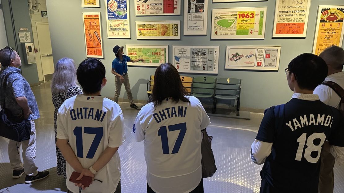 Kay Ponak leads a Japanese language tour of Dodger Stadium.