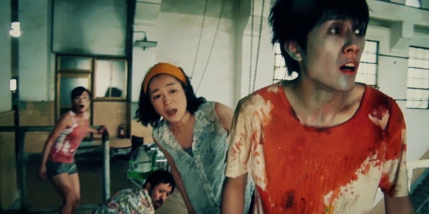 A group of terrified characters in One Cut of the Dead