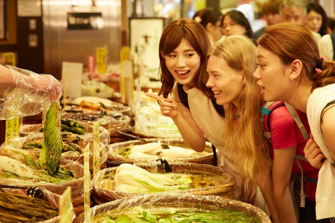 Japanese woman showing tourist vegetables