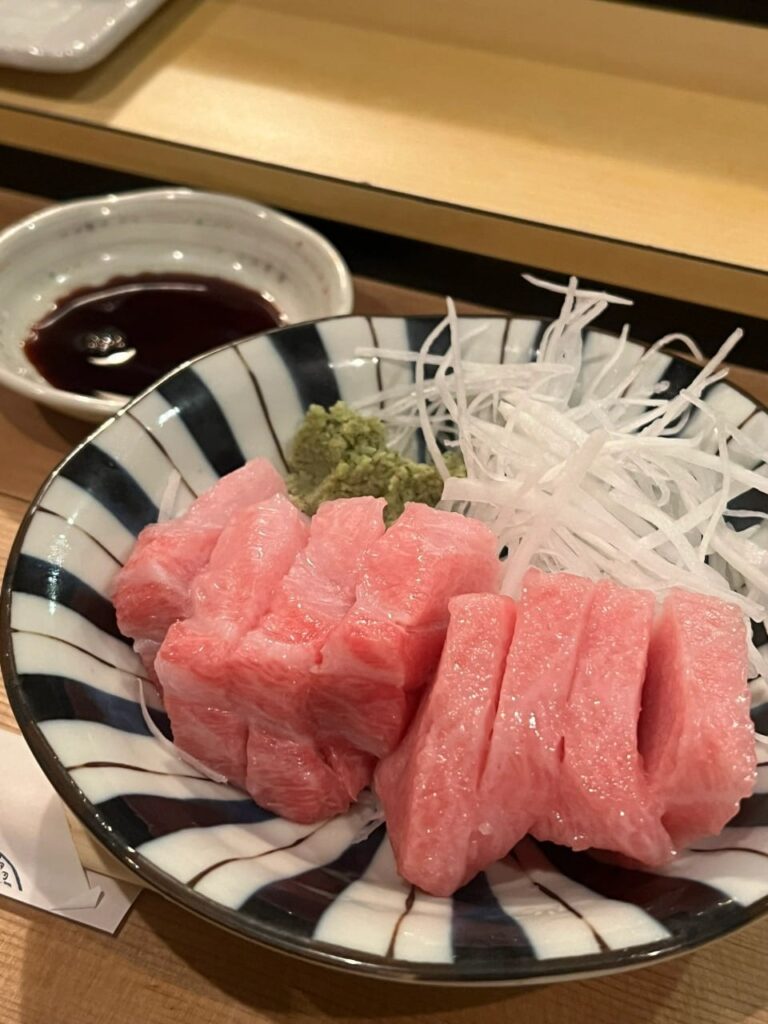 Delicious tuna belly with soy sauce and wasabi sauce is a perfect match!