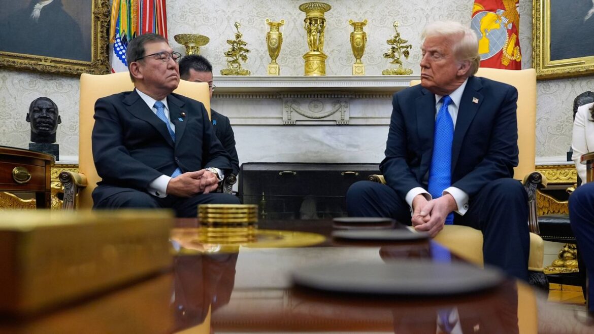 President Donald Trump speaks with Japanese Prime Minister Shigeru Ishiba in the Oval Office of the White House, Friday, Feb. 7, 2025, in Washington. (AP Photo/Alex Brandon)