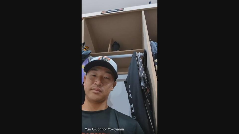 Mizuki Akatsuka speaks with CBC News over video chat with his translator and teammate, Yuri O'Connor Yokoyama, off screen.