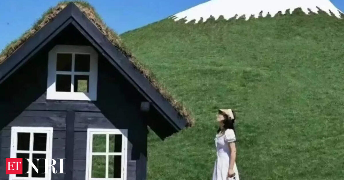 China's own Mount Fuji? A hilltop in the Asian country gets a white makeover, sparks laughter