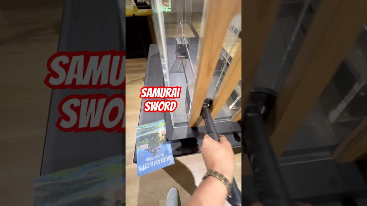 Holding a real samurai sword at Okayama Castle #samuraisword #okayama #japan