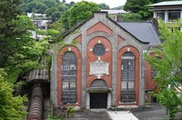 The old main building of Keage power station is seen from the current facility operated by Kanasai Electric Power Co., on May 16, 2025, in Kyoto's Sakyo Ward. The building was completed in 1912. The water wheel and other structures that used to be in the building have been removed. (Mainichi/Yoko Minami)