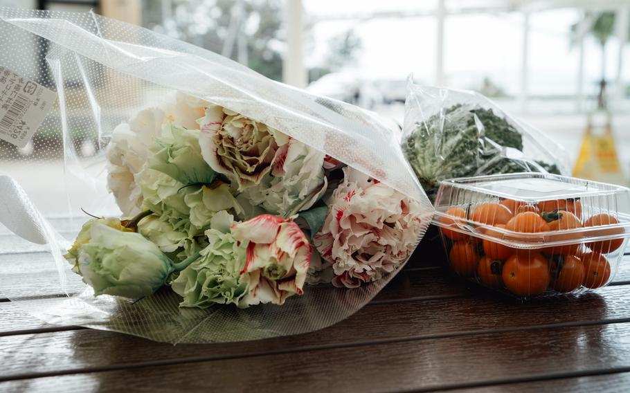 flowers and fruits on the table.