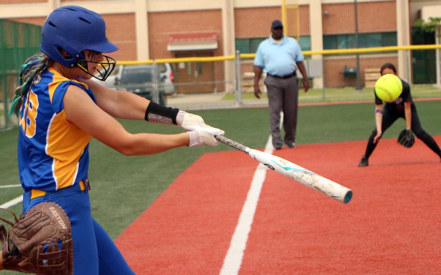 Yokota’s Claire Smith tags the ball against Perry.