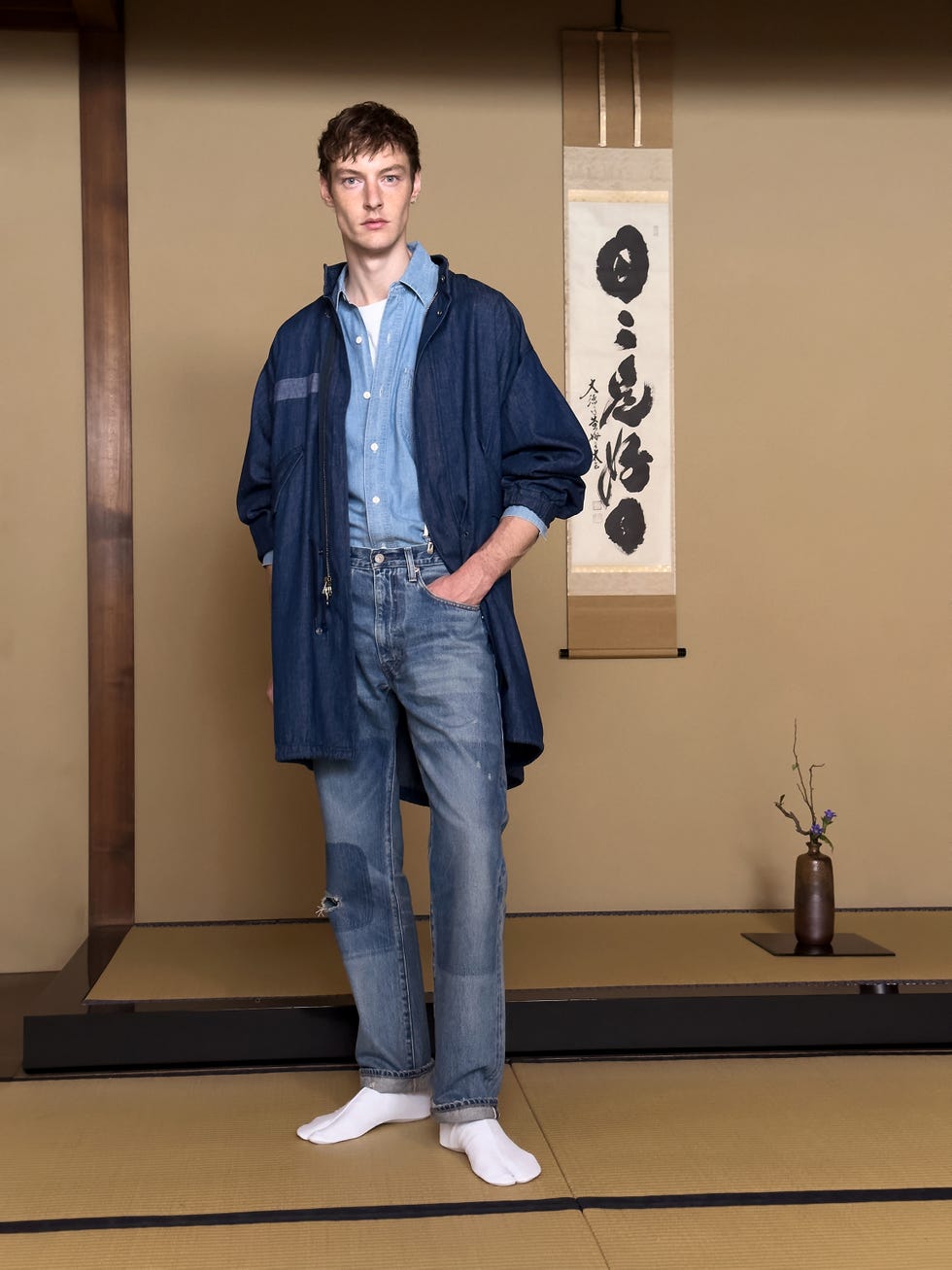 the new blue tab collection includes standout pieces like this indigo hued take on the fishtail parka