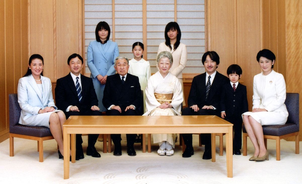 In this photo released by the Imperial Household Agency, Japan's Emperor Akihito, center left, and Empress Michiko, center right, smile to Prince Hisahito, fifth from right, as their imperial family members gather on a photoshoot held on December 14, 2010 for the annual official photo session for the new year at the Imperial Palace in Tokyo, Japan. Also pictured are from left, Crown Princess Masako, Crown Prince Naruhito, Princess Mako, behind Akihito, Princess Aiko, Princess Kako, Prince Akishino, Prince Hisahito and Princess Kiko. 