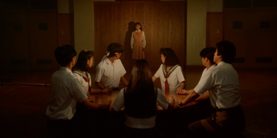 A group of students looking at the outcasted student