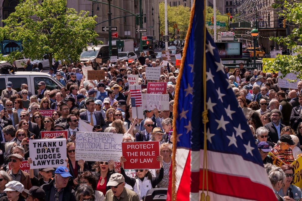 People take part in a May Day rally for the Rule of Law, Thursday, May 1, 2025, in New York.