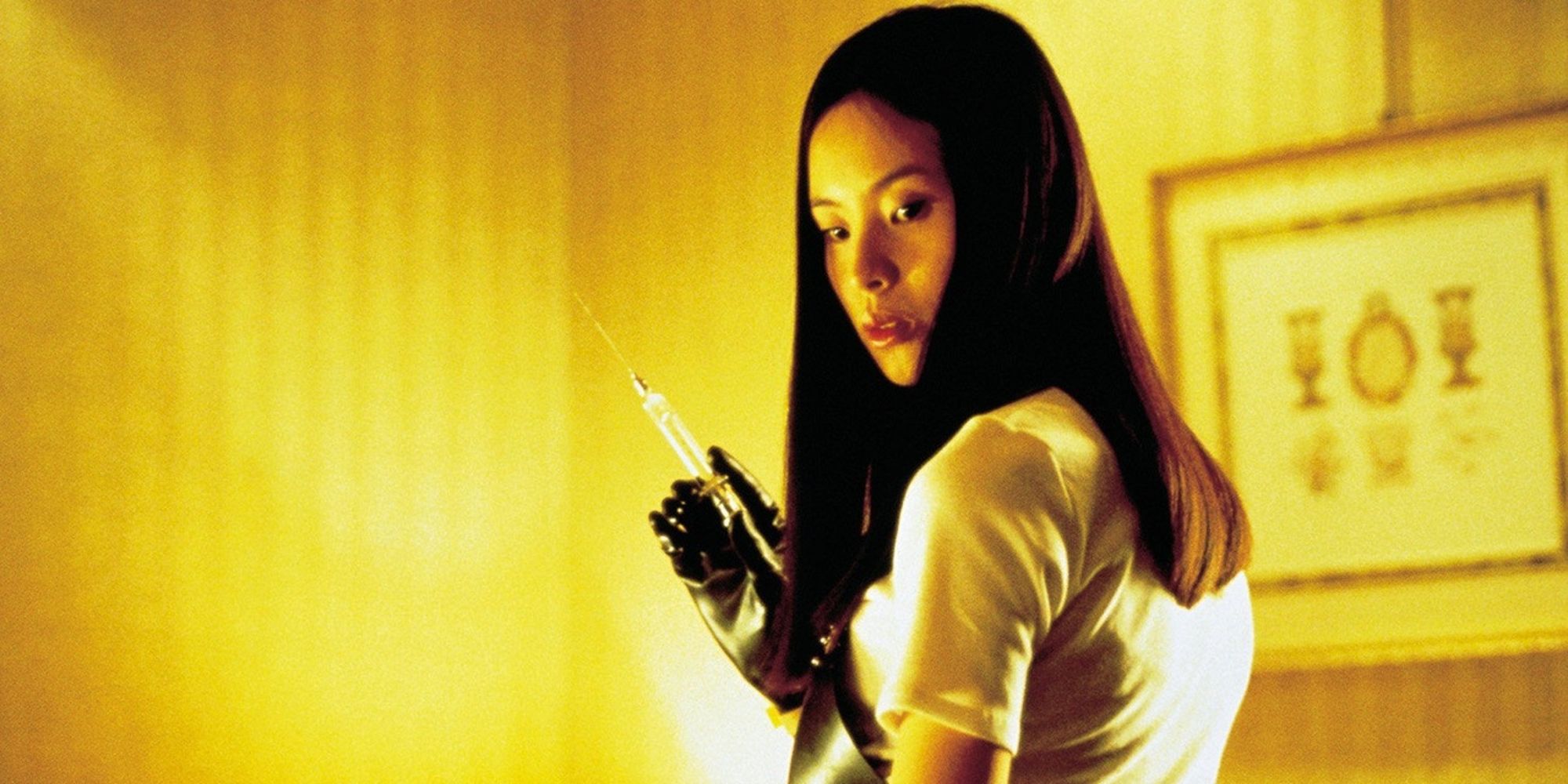 A young woman holding a needle and turning around in Audition