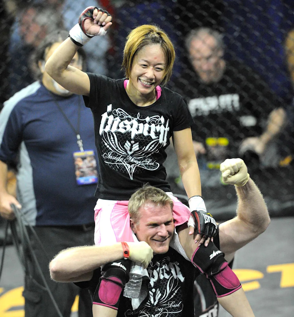 12 August 2010: Megumi Fujii of Japan (pink and white trunks) celebrates after defeating Carla Esparza via armbar submission in the Women's Division in Bellator 24 of season 3 of the Bellator Fighting Championships at the Seminole Hard Rock Casino and Hotel in Hollywood, Florida. (Photo by Doug Murray/Icon SMI/Icon Sport Media via Getty Images)
