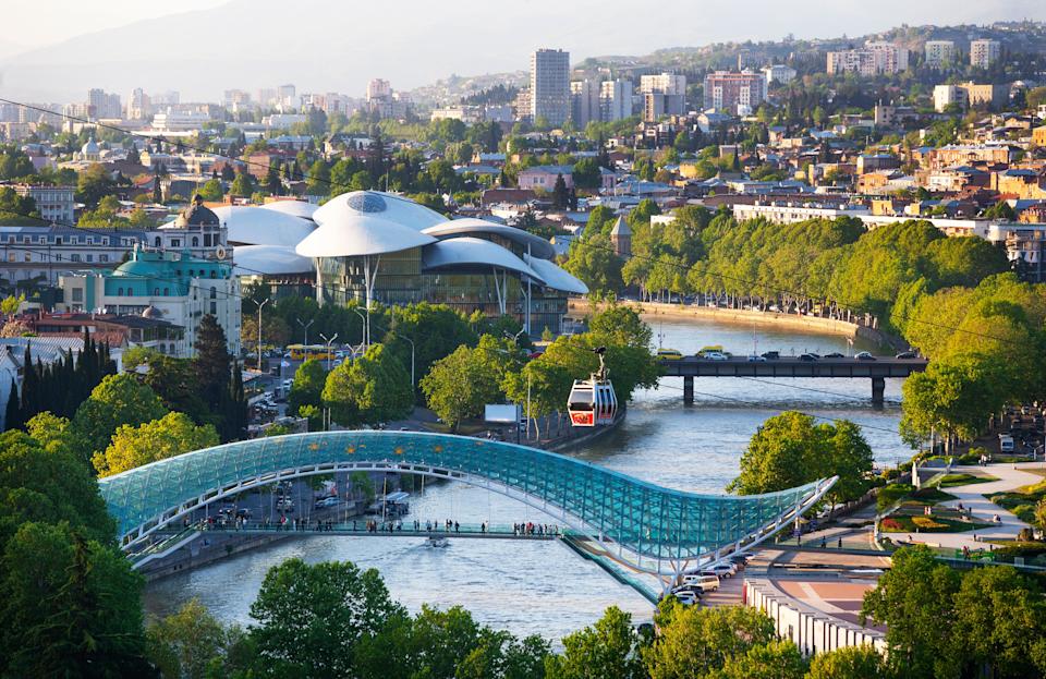 Looking out towards the Bridge of Peace over Kura river in Tbilisi, Georgia.