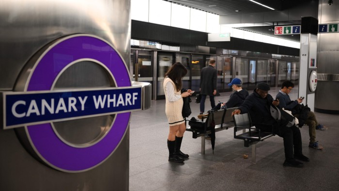 Tokyo Metro brought in to run London’s Elizabeth Line Commuters wait at the Canary Wharf Elizabeth Line station.