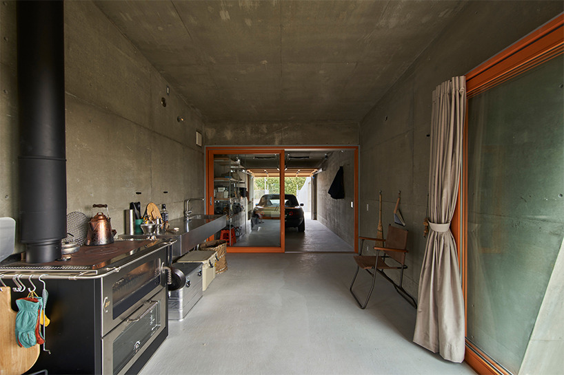 concrete isumi villa by takeshi hosaka architects organically spreads over land in japan