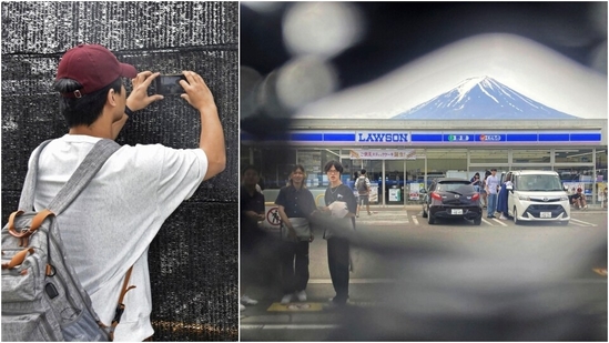 Mt Fuji is seen through a hole on a black screen installed across from a convenience store in Fujikawaguchiko town. (AP)
