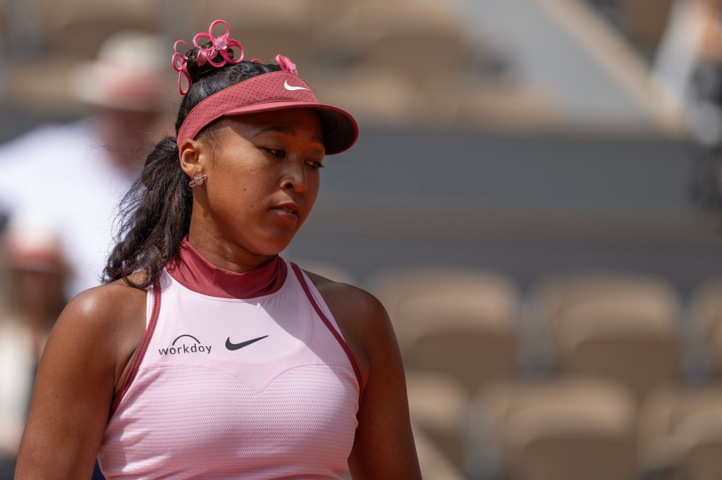 Naomi Osaka won the first set against Paula Badosa but lost the next two.