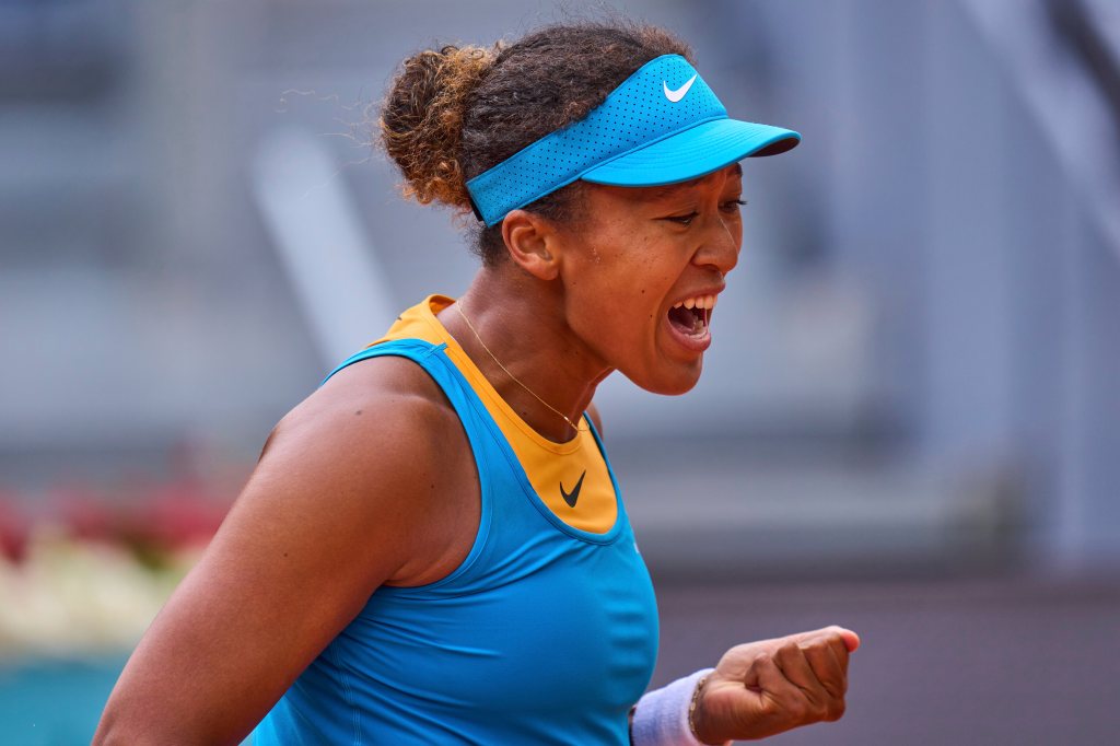 Naomi Osaka, of Japan, reacts during her match against Lucia Bronzetti, of Italy, at the Madrid Open tennis tournament in Madrid, Spain, Tuesday, April 22, 2025. 