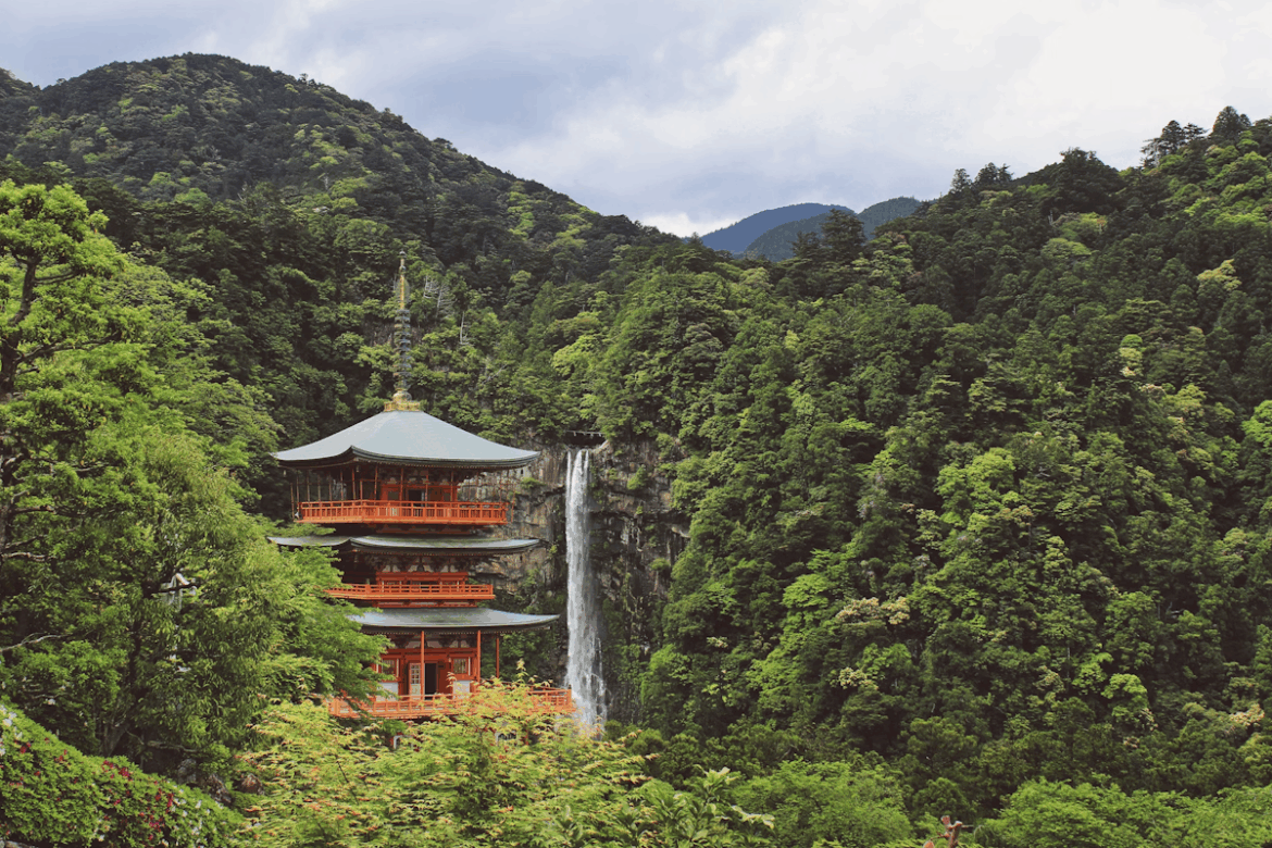 Last-Minute Japan Travel Guide: Stress-Free Planning and Accommodation Tips Rewarding view of Nachi-san after trekking the Kumano Kodo in Wakayama, Japan.