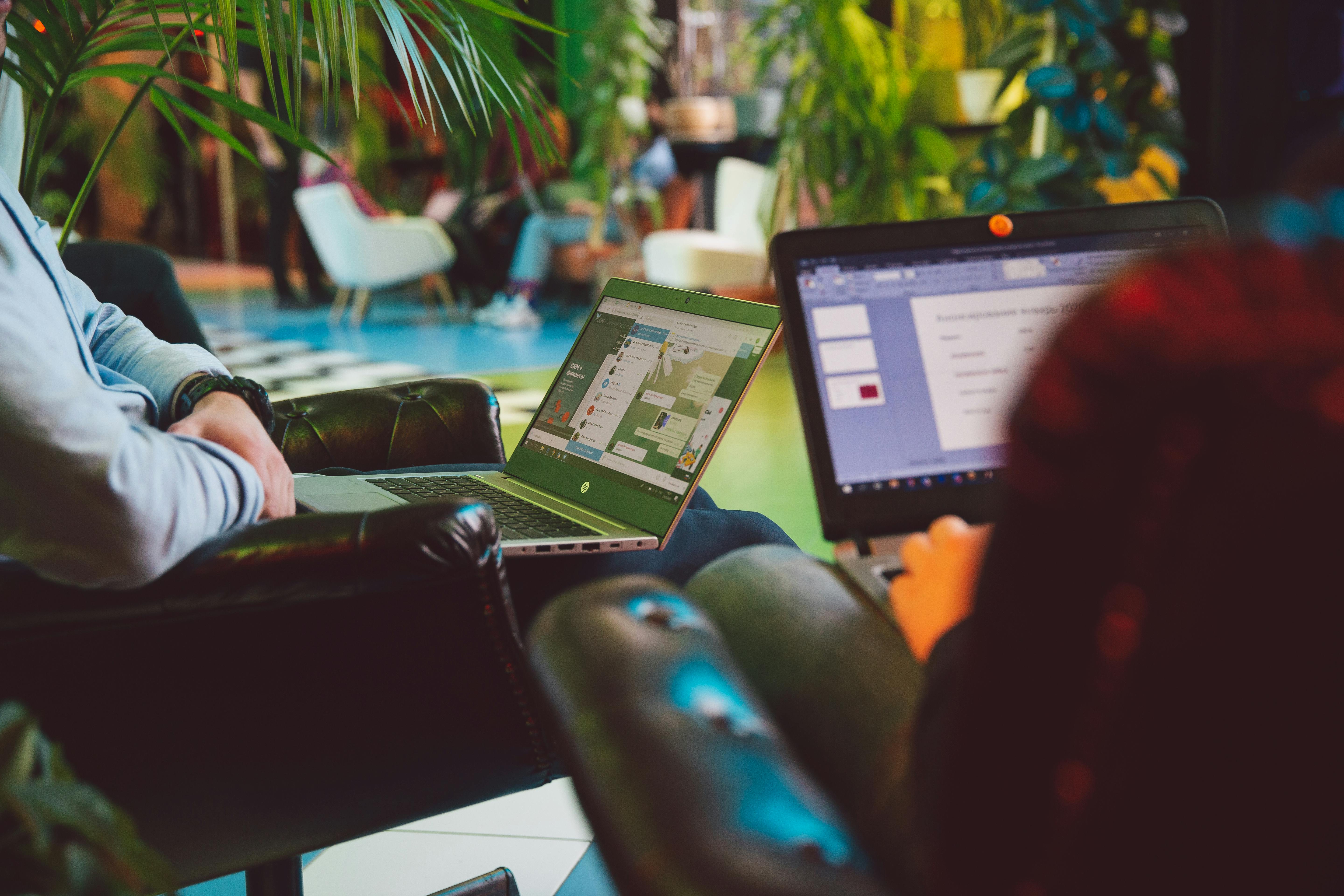 Two digital nomads working in cowork space Photo by Polina Zimmerman via Pexels.com