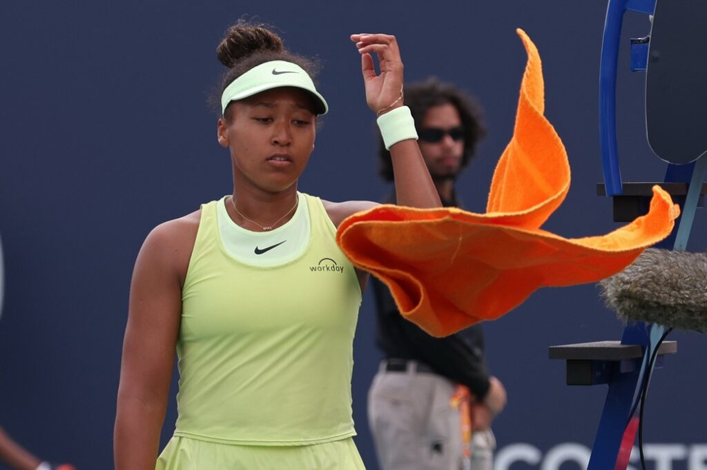 Mar 22, 2025; Miami, FL, USA; Naomi Osaka (JPN) throws her towel after losing a game against Hailey Baptiste (USA)(not pictured) on day five of the Miami Open at Hard Rock Stadium.