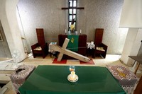 The cross that once adorned the top of the old chapel of Shuri Church is seen inside the church in Naha, May 21, 2025. After surviving the flames of war with some damage, it was repaired and used at the church. Following the demolition of the old chapel in 1984, it is now stored inside the church. (Mainichi/Shinnosuke Kyan)