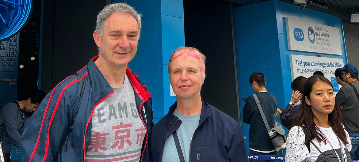 Phil Malone (left) and his companion visit the UN Pavilion.