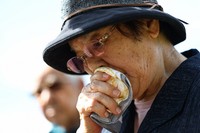 Yoshiko Chinen, 84, sheds tears as she remembers her two older brothers who died in the war, at the Konpaku-no-to Monument in Itoman, Okinawa Prefecture on Okinawa Memorial Day, June 23, 2025. She commented, 