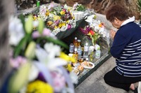 Many flowers and snacks are offered at the Konpaku-no-to Monument in Itoman, Okinawa Prefecture, on Okinawa Memorial Day, June 23, 2025. Visitors continued to arrive at the monument to pray from early in the morning. (Mainichi/Tatsuro Tamaki)