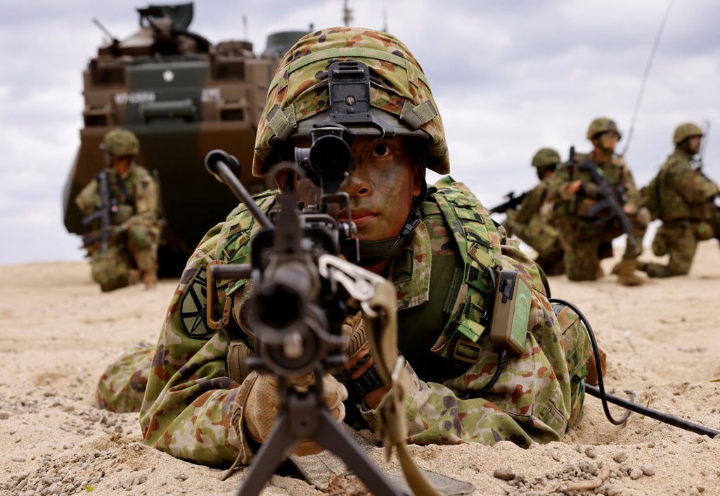 Japanese Ground Self-Defence Force soldiers take part in a marine landing drill in Kagoshima prefecture, southwestern Japan, in November 2023. Photo: Reuters