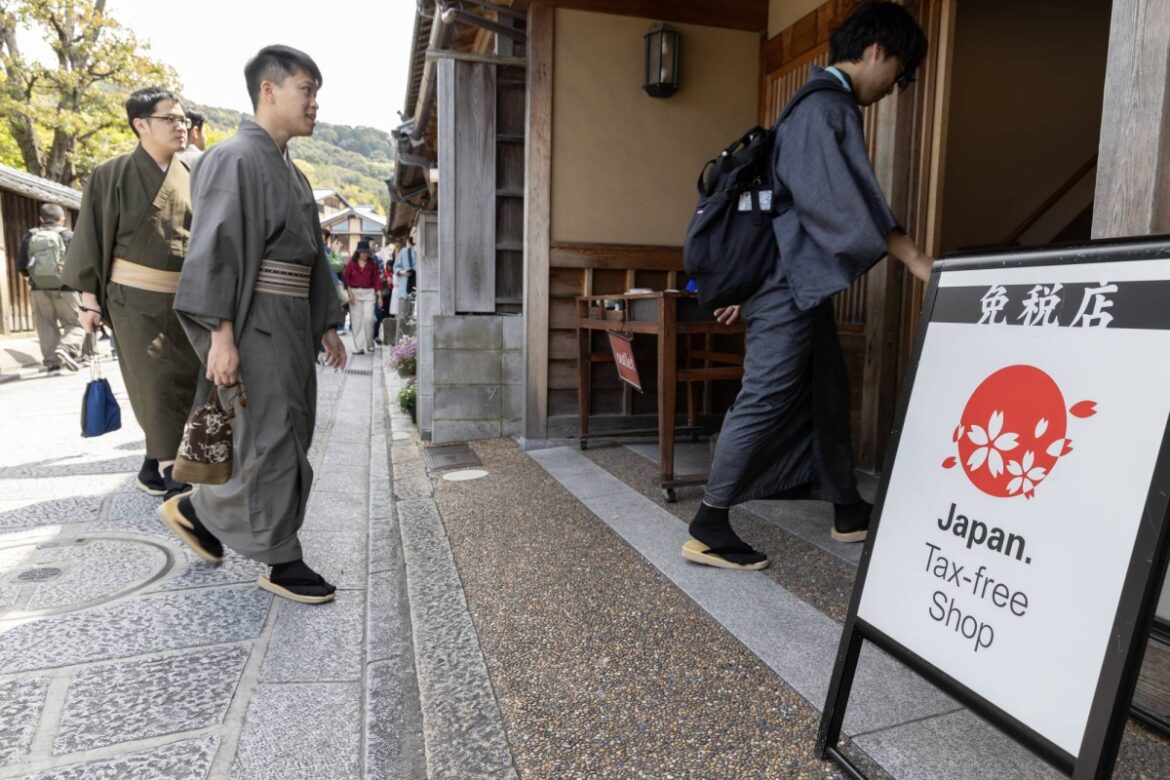 Japan eyes tougher rules for foreign residents and tax hike for tourists