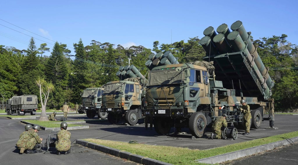 Japanese soldiers deploy Type-88 surface-to-ship short-range missiles as part of joint military drills with the US last year. Photo: Kyodo / AP
