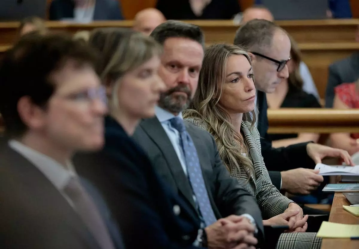 Karen Read sits with her defense team, from left, Robert Alessi, Elizabeth Little, Alan Jackson, and David Yannetti during her murder retrial in Norfolk Superior Court, in Dedham, Mass., Monday June 2, 2025. (Pat Greenhouse/The Boston Globe via AP, Pool)