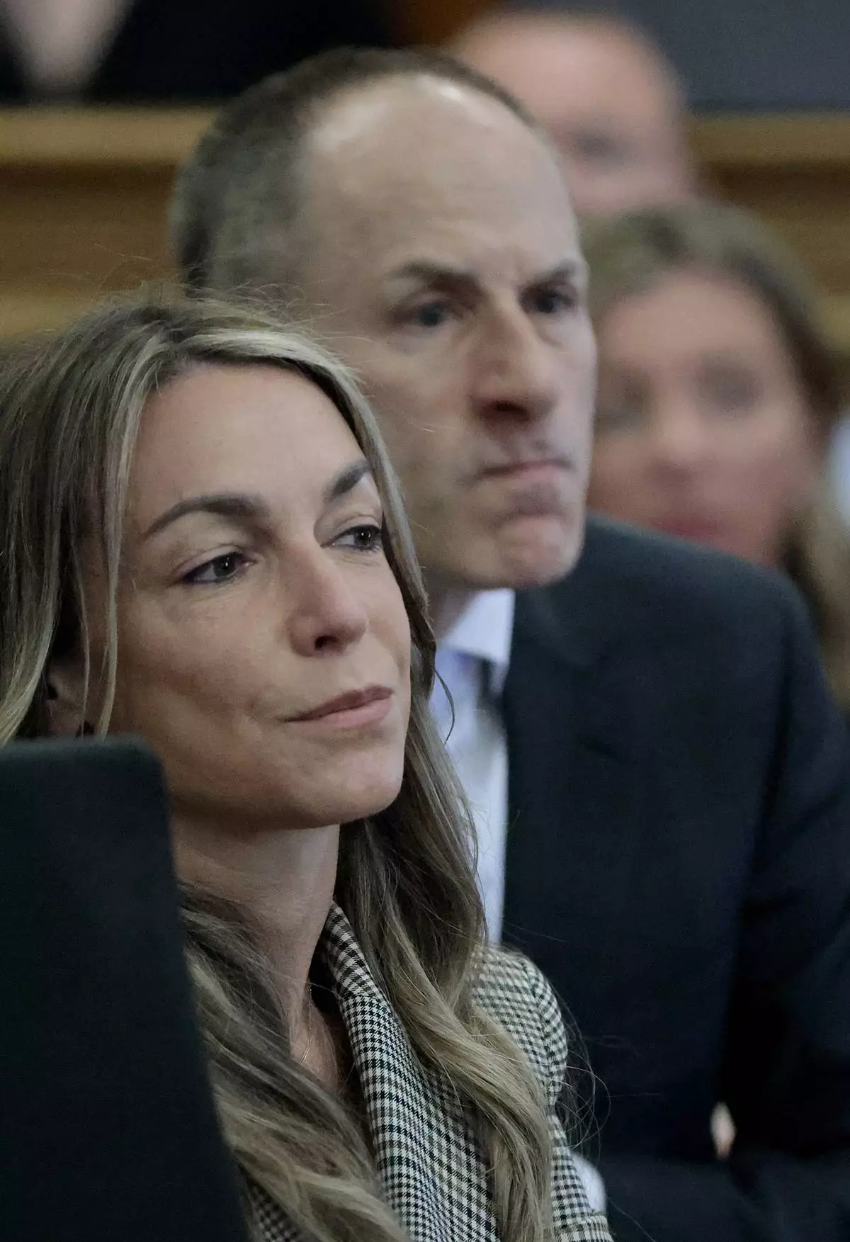 Karen Read watches the testimony of Boston Police officer Kelly Dever during her murder retrial in Norfolk Superior Court, in Dedham, Mass., Monday June 2, 2025. (Pat Greenhouse/The Boston Globe via AP, Pool)