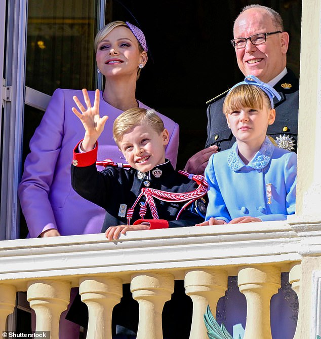 Charlene and her twins Princess Gabriella and Prince Jacques have decided against travelling to Japan amid 'current events' in the Middle East (seen together with Albert during army parade in November, 2024)