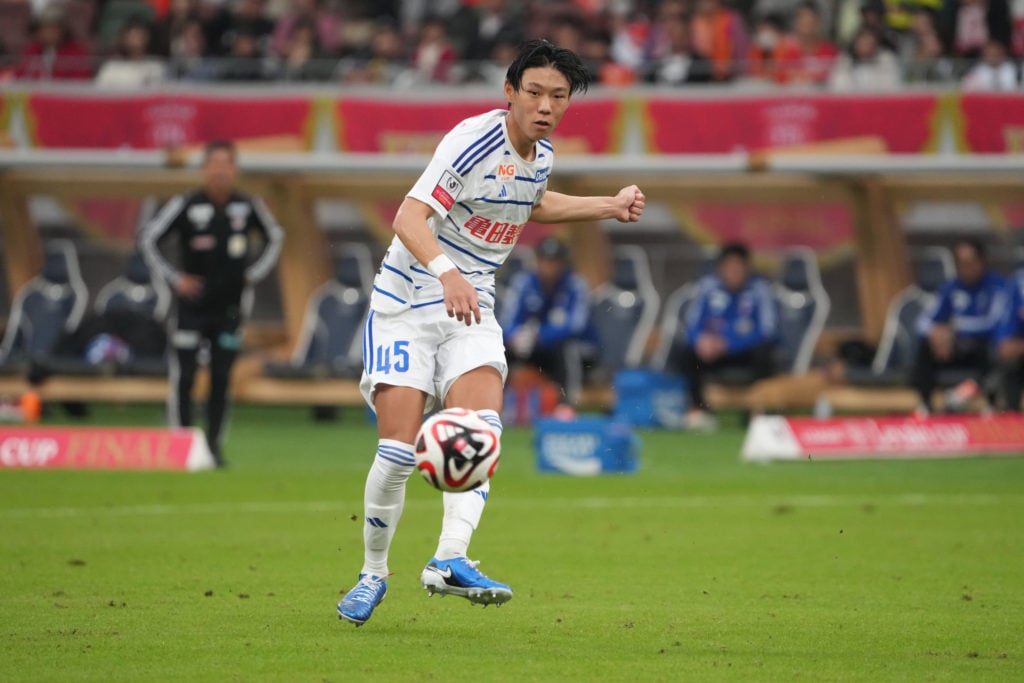 Hayato Inamura of Albirex Niigata tries to control the ball during the J League fixture against Nagoya Grampus