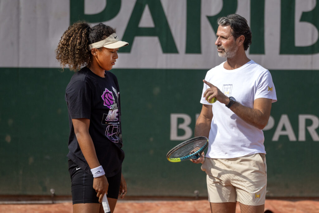 Naomi Osaka of Japan with coach Patrick Mouratoglou during practice on Court Simonne-Mathieu in preparation for the 2025 French Open Tennis Tournament at Roland Garros.
